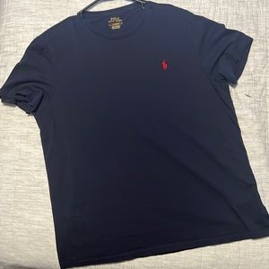 Large black polo brand T-shirt